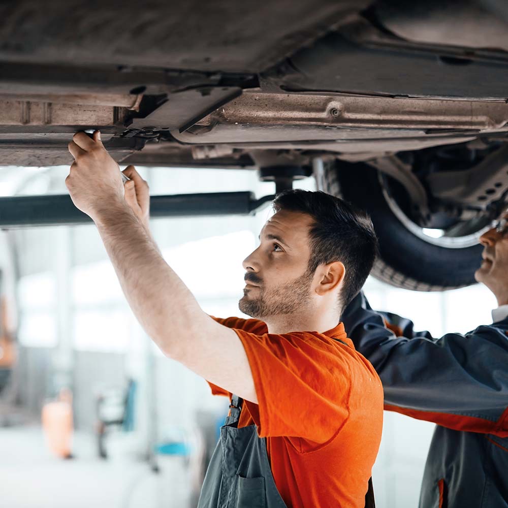 Car mechanic working at a service center
